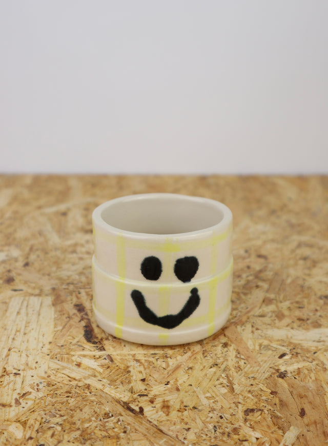 You are funny cup in yellow grid