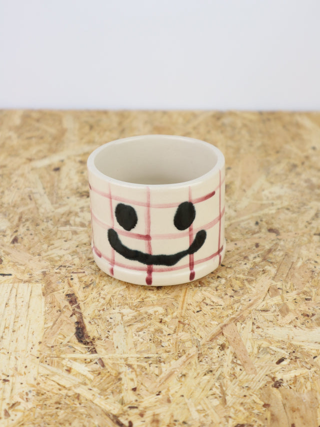You are funny cup in maroon grid