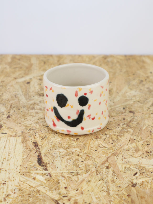 You are funny cup in red and orange dots
