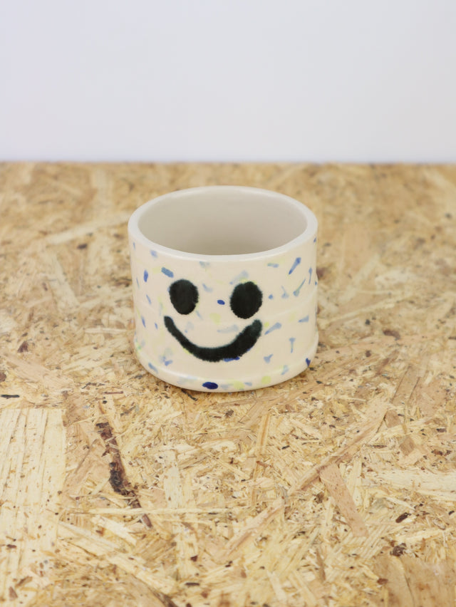 You are funny cup in blue & green dots