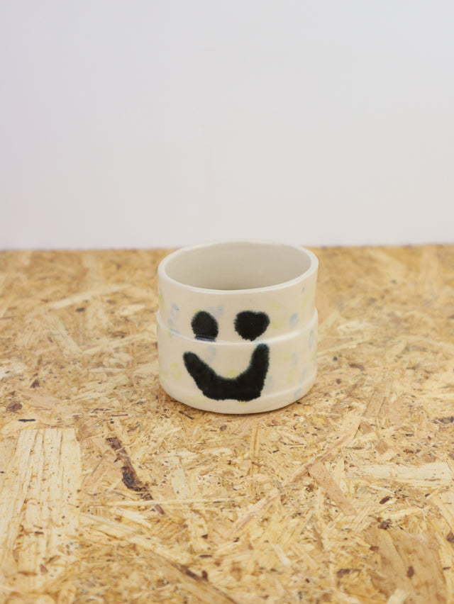 You are funny cup in green & blue dots