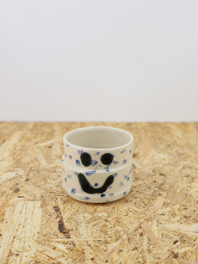 You are funny cup in blue dots