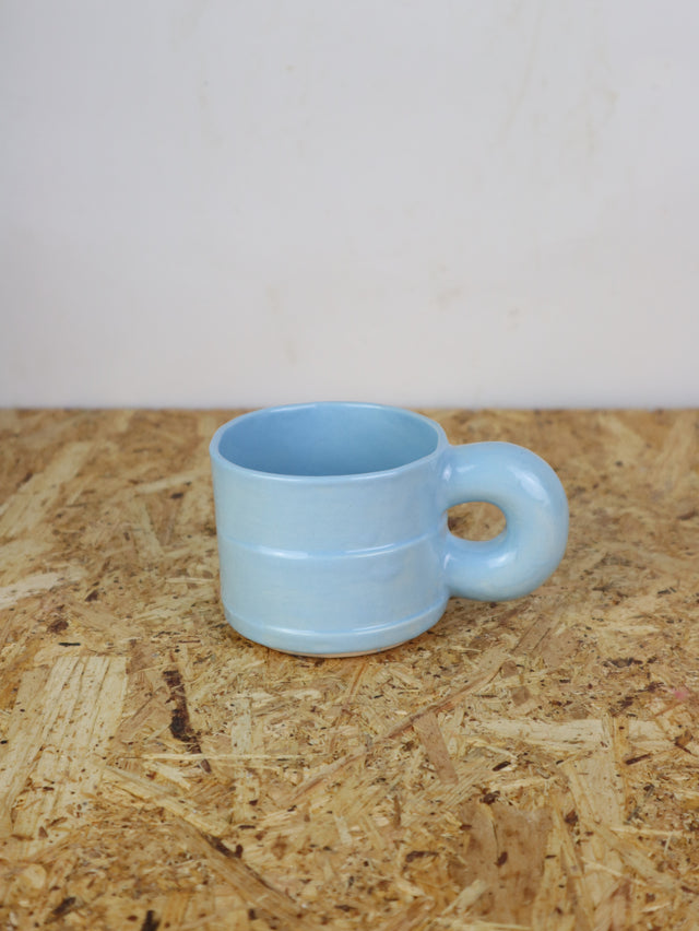 Dialog cup in light blue sky