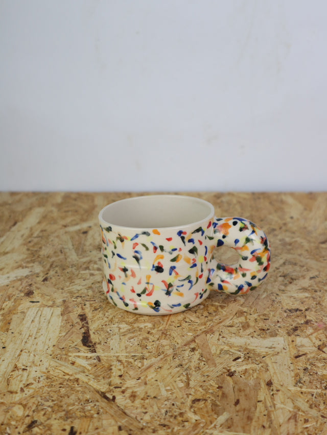 Dialog cup in kind of clown colors