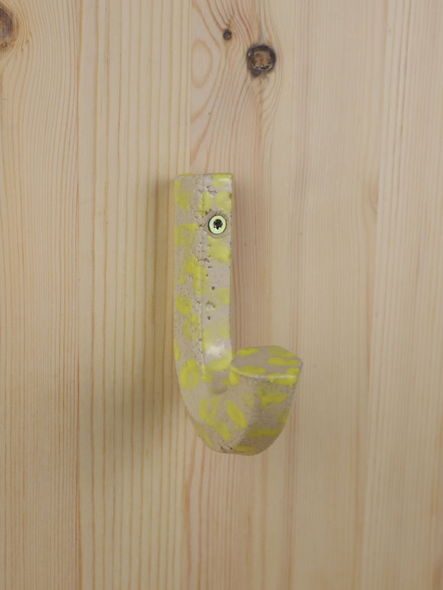 "Yellow drip" Extruded hanger