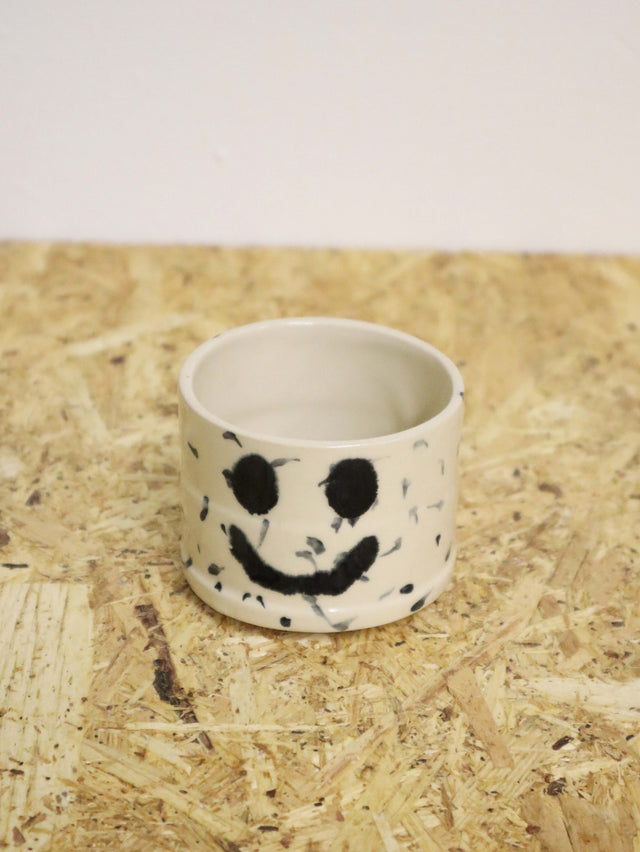 You are funny cup in black dots