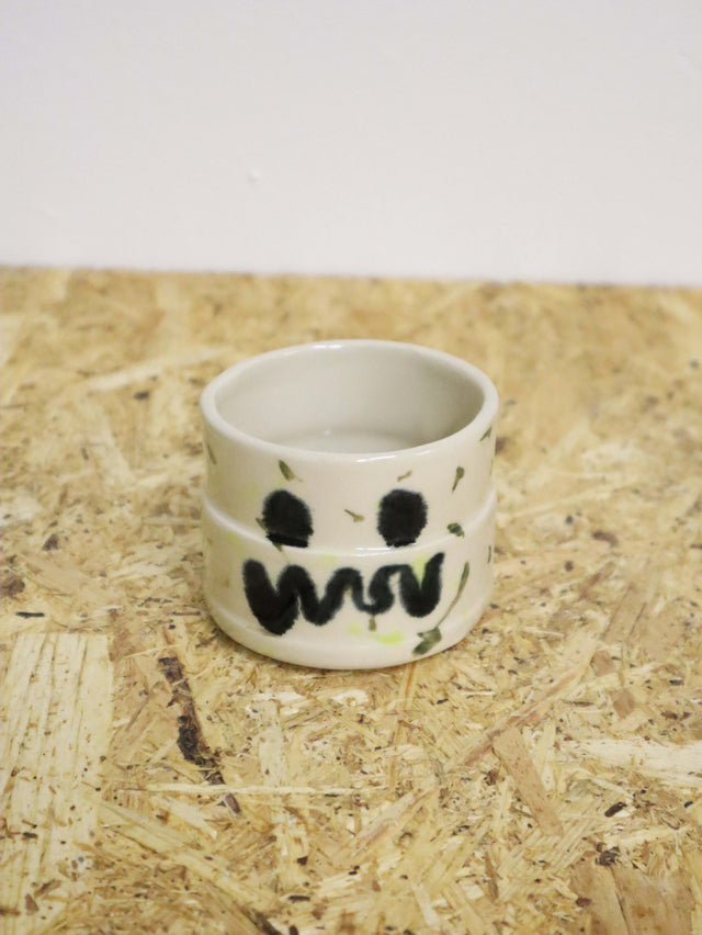 You are kind of funny cup in green dots